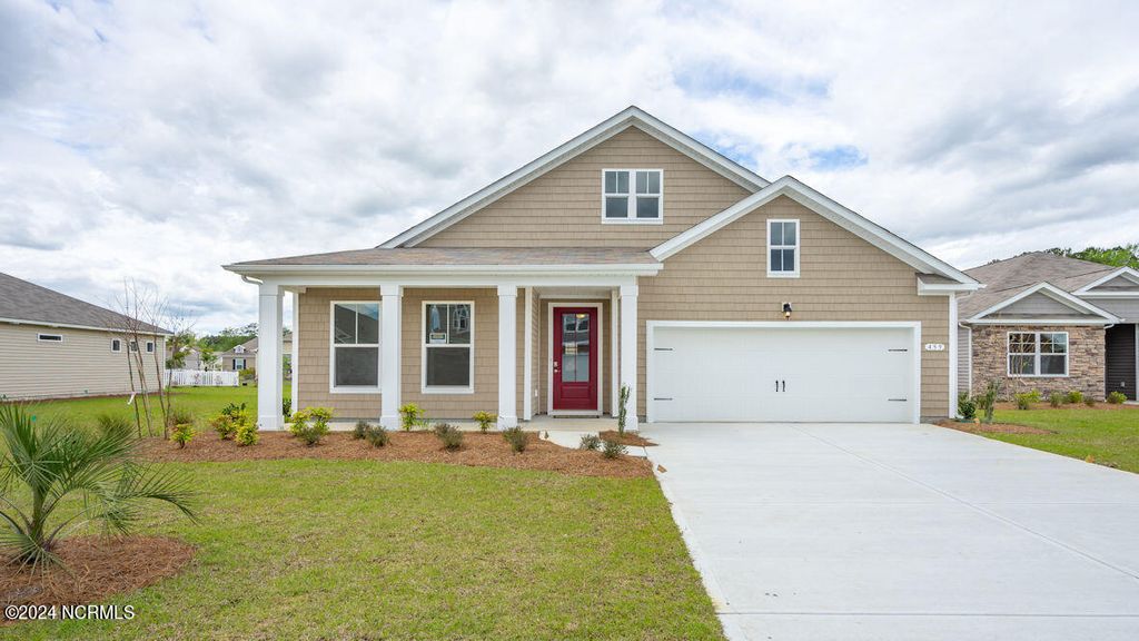 Photo of 1214 Woodhouse Drive NW, Ash, NC 28420 (MLS # 100504714)