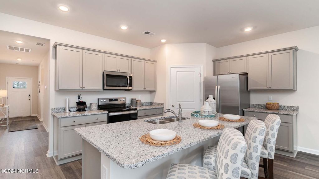 Photo of 1214 Woodhouse Drive NW, Ash, NC 28420 (MLS # 100504714)