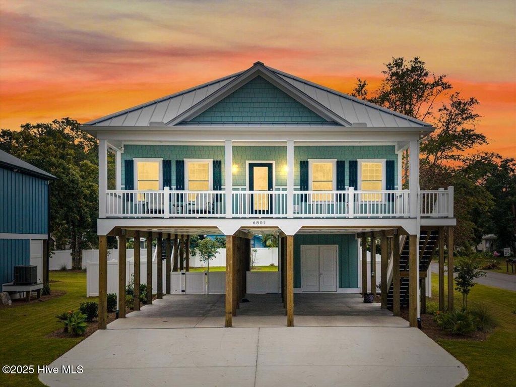 Photo of 6801 E Yacht Drive, Oak Island, NC 28465 (MLS # 100530301)