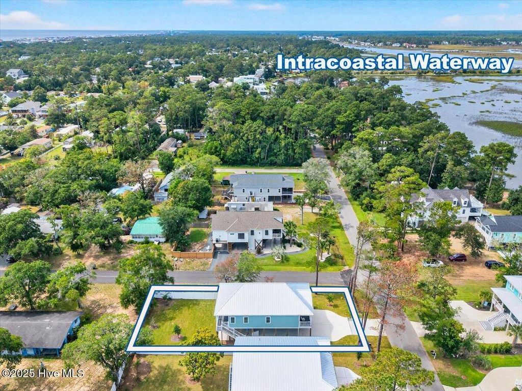 Photo of 6801 E Yacht Drive, Oak Island, NC 28465 (MLS # 100530301)