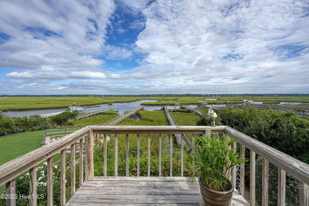 Photo of 502 N Shore Drive W, Sunset Beach, NC 28468 (MLS # 100522322)