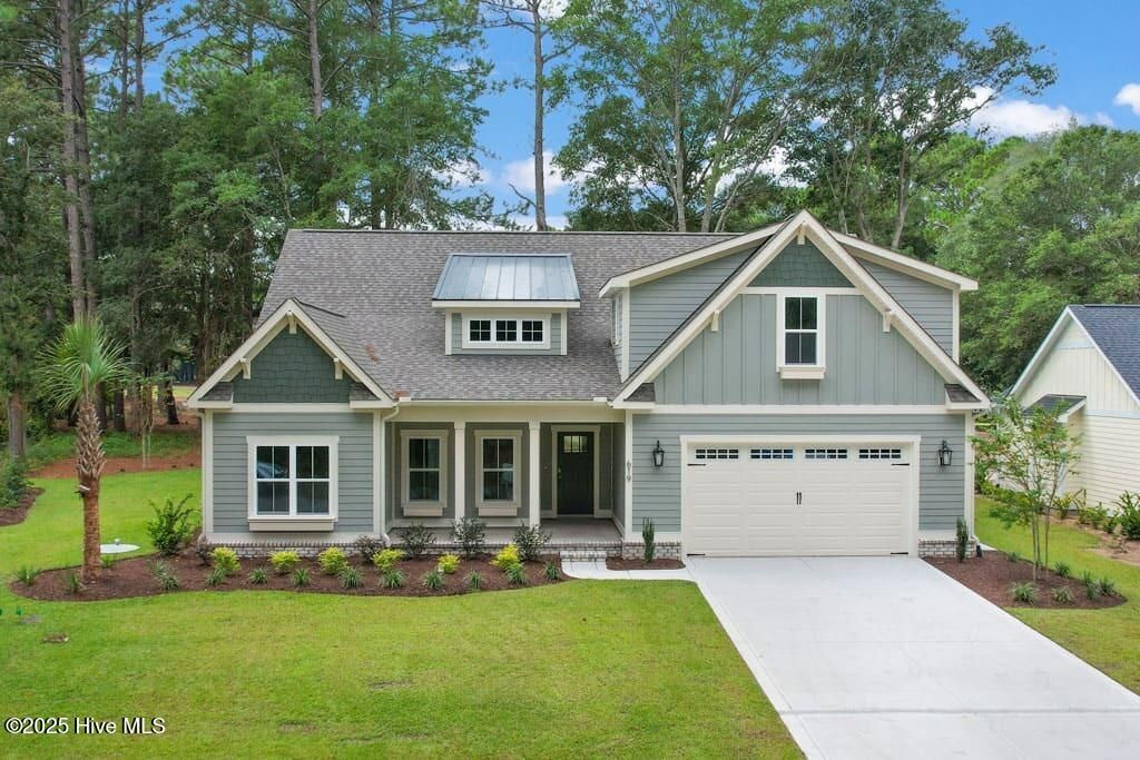 Photo of 619 Wisteria Lane, Sunset Beach, NC 28468 (MLS # 100529447)