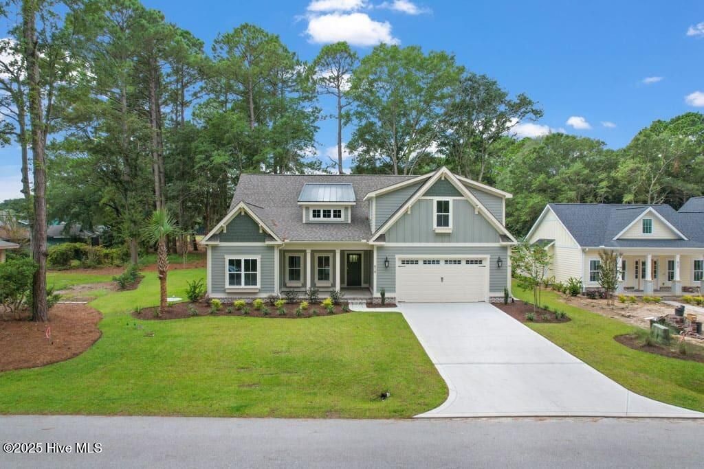 Photo of 619 Wisteria Lane, Sunset Beach, NC 28468 (MLS # 100529447)