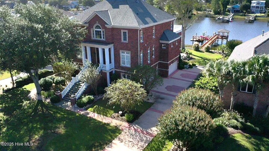 Photo of 2775 Pinecrest Drive SE, Southport, NC 28461 (MLS # 100542598)