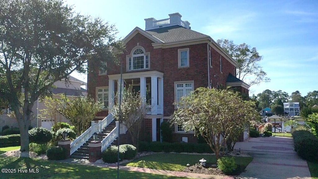 Photo of 2775 Pinecrest Drive SE, Southport, NC 28461 (MLS # 100542598)