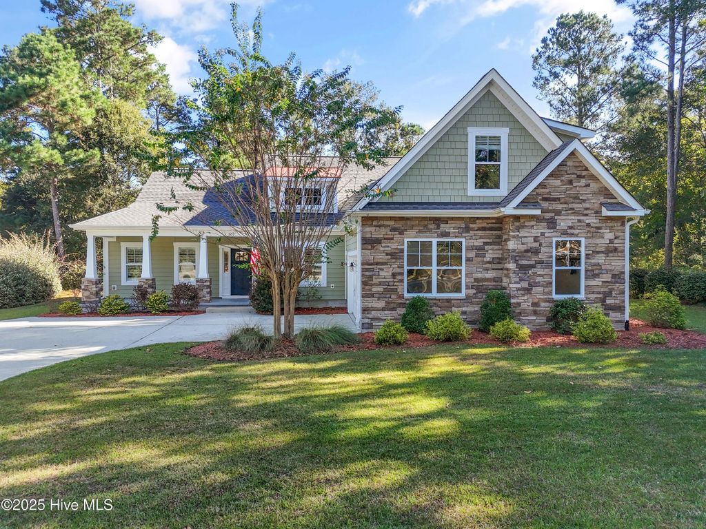 Photo of 557 Button Bush Lane, Hampstead, NC 28443 (MLS # 100534757)