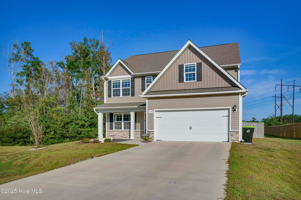 Photo of 697 Poppleton Drive, Hampstead, NC 28443 (MLS # 100533254)