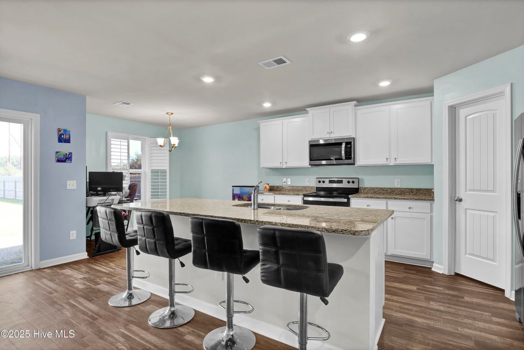 Photo of 697 Poppleton Drive, Hampstead, NC 28443 (MLS # 100533254)