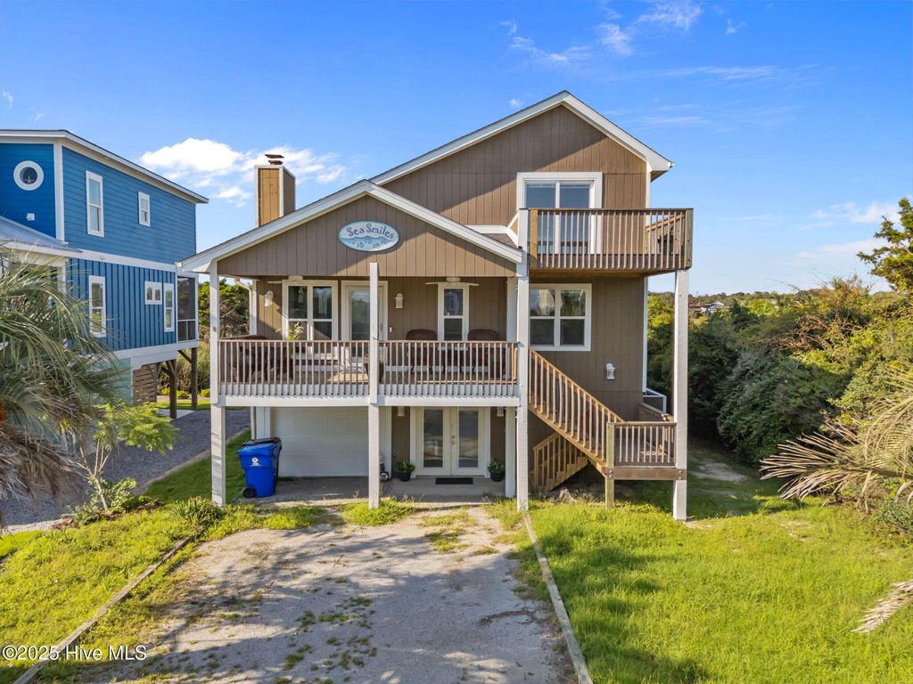 Photo of 312 E Dolphin Drive, Oak Island, NC 28465 (MLS # 100526723)