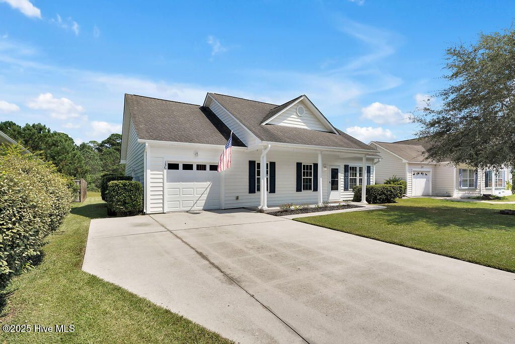 Photo of 136 N Palm Drive, Winnabow, NC 28479 (MLS # 100525170)