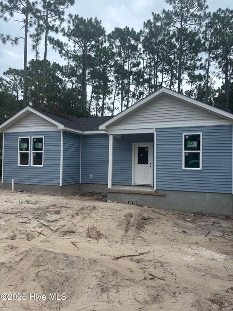 Photo of 1840 Raeford Road, Boiling Spring Lakes, NC 28461 (MLS # 100523019)