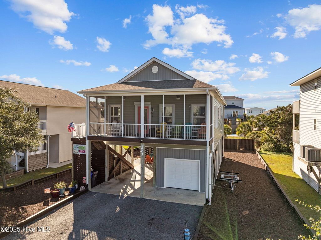 Photo of 1903 E Pelican Drive, Oak Island, NC 28465 (MLS # 100540020)