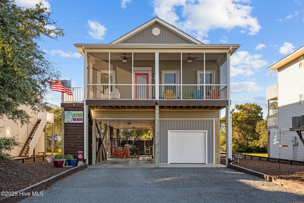 Photo of 1903 E Pelican Drive, Oak Island, NC 28465 (MLS # 100540020)