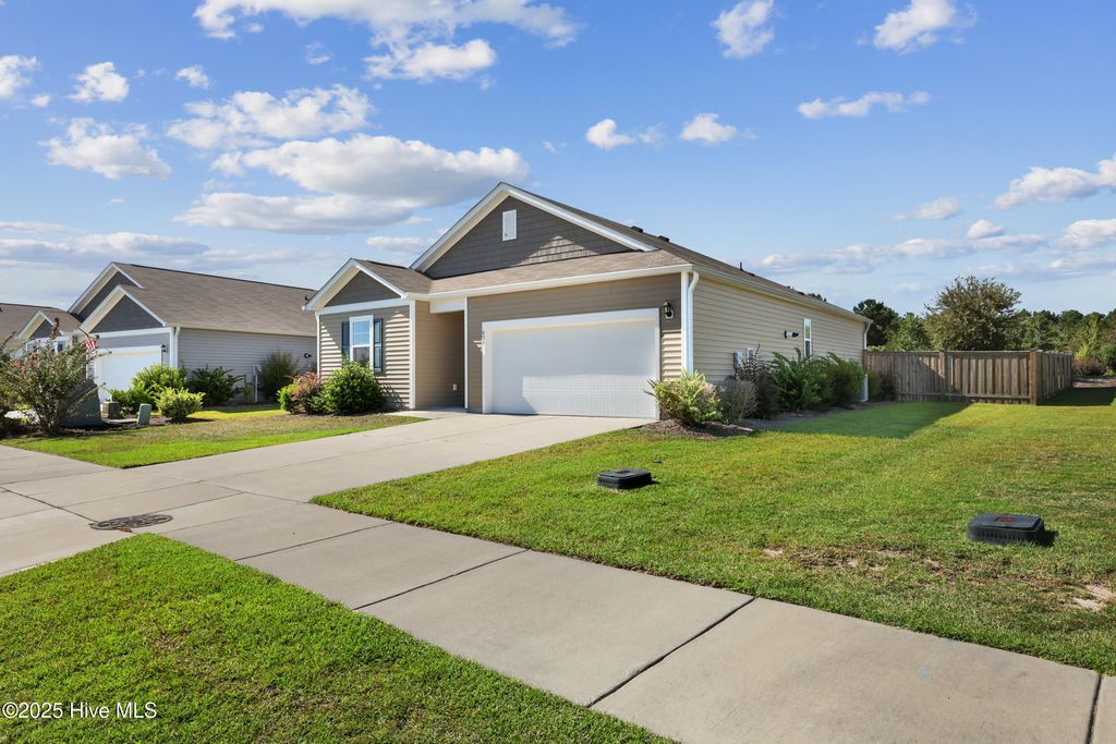 Photo of 420 St Kitts Way, Winnabow, NC 28479 (MLS # 100529036)
