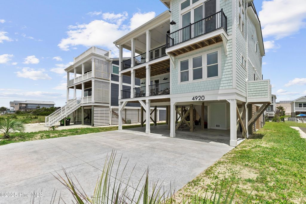 Photo of 4920 E Beach Drive, Oak Island, NC 28465 (MLS # 100518481)