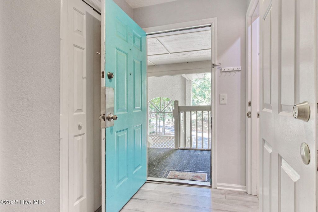 Photo of 223 Clubhouse Road #5, Sunset Beach, NC 28468 (MLS # 100528000)