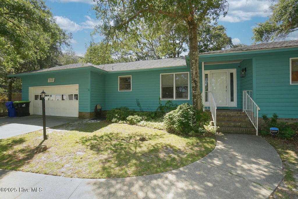 Photo of 103 Throckmorton Street, Oak Island, NC 28465 (MLS # 100522613)