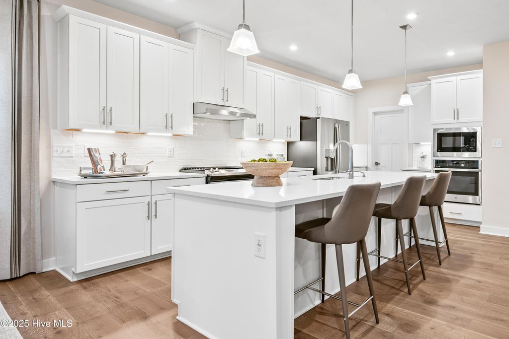 Photo of 4158 Farmfield Drive, Navassa, NC 28451 (MLS # 100522571)