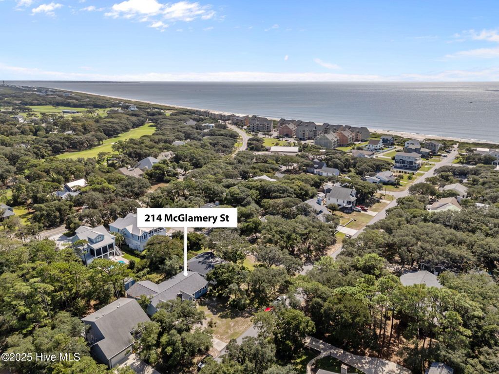 Photo of 214 Mcglamery Street, Oak Island, NC 28465 (MLS # 100534708)