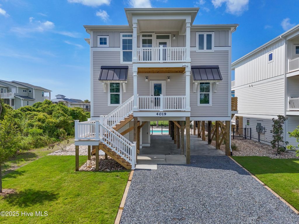 Photo of 4019 E Pelican Drive, Oak Island, NC 28465 (MLS # 100448702)