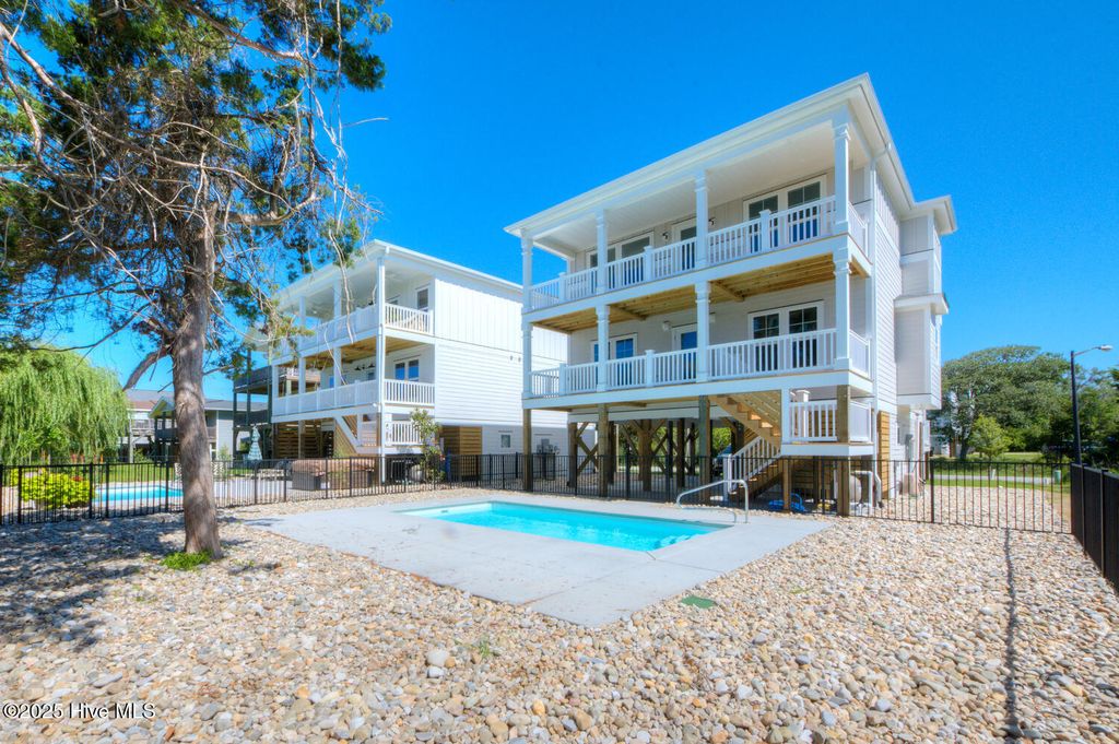 Photo of 4019 E Pelican Drive, Oak Island, NC 28465 (MLS # 100448702)