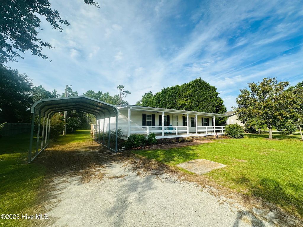 Photo of 5193 Lakewood Drive SW, Shallotte, NC 28470 (MLS # 100528172)