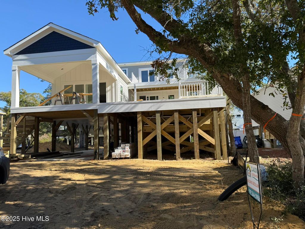 Photo of 100 SE 43rd Street, Oak Island, NC 28465 (MLS # 100541955)