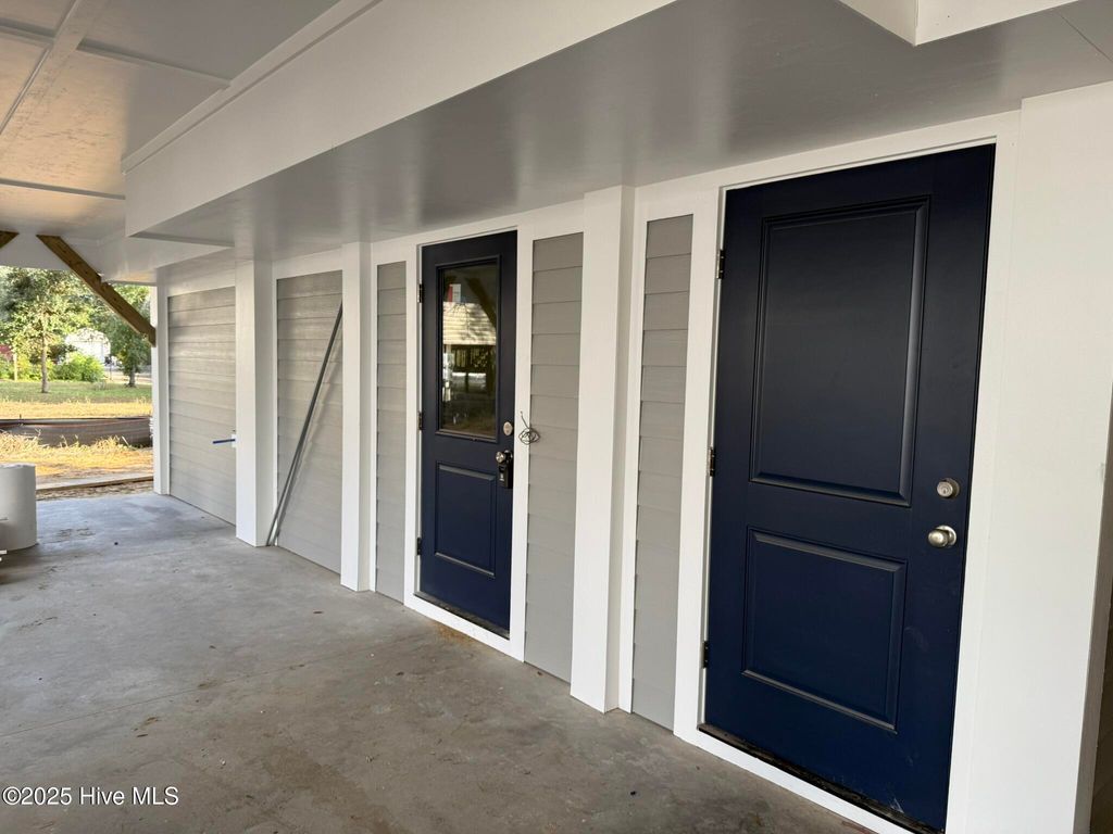 Photo of 100 SE 43rd Street, Oak Island, NC 28465 (MLS # 100541955)