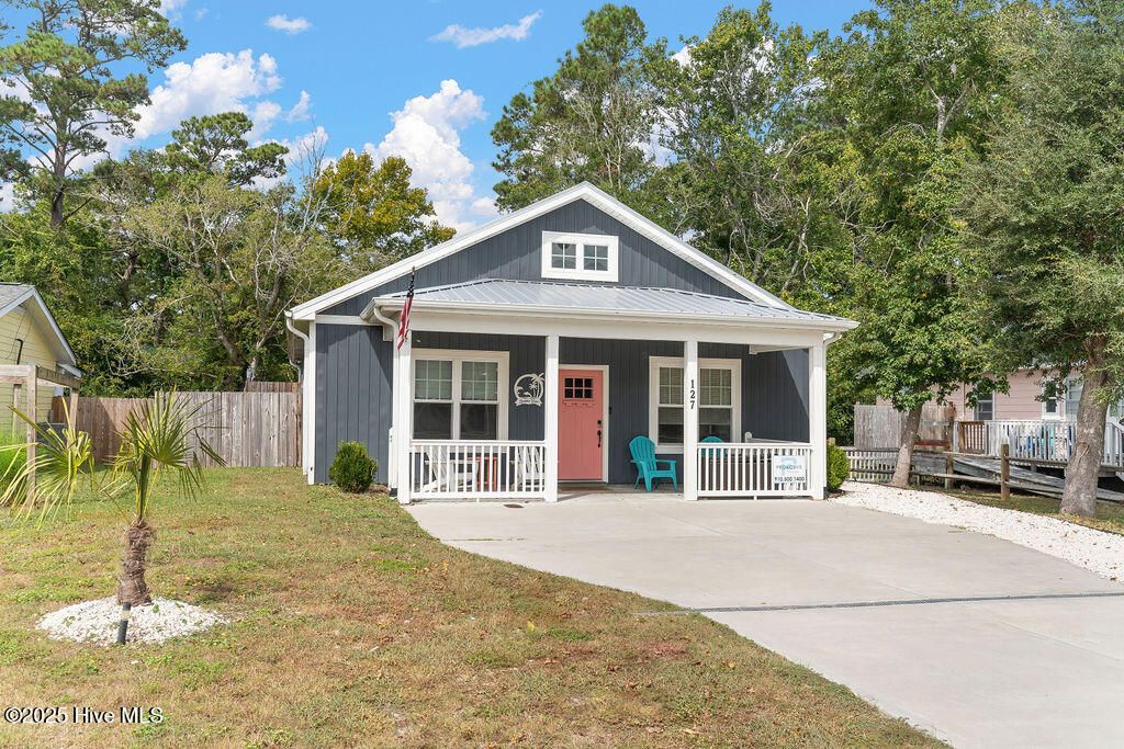 Photo of 127 NW 20th Street, Oak Island, NC 28465 (MLS # 100537139)