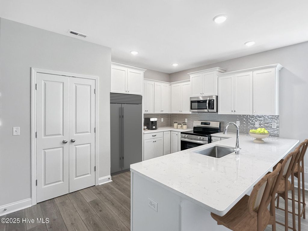 Photo of 3973 Pepperberry Lane, Southport, NC 28461 (MLS # 100478873)