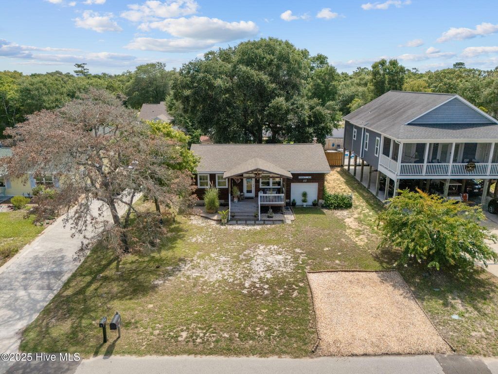 Photo of 132 NE 3rd Street, Oak Island, NC 28465 (MLS # 100522385)
