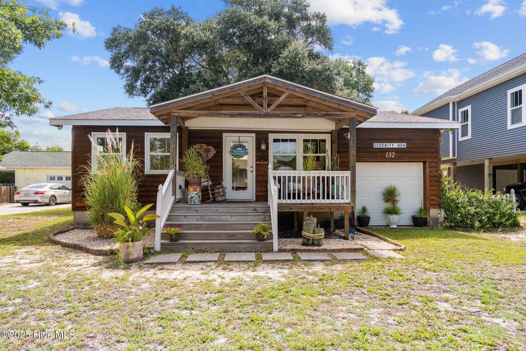Photo of 132 NE 3rd Street, Oak Island, NC 28465 (MLS # 100522385)