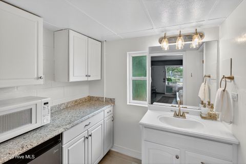 Tiny photo for 7246 Wrightsville Avenue #Unit 105, Wilmington, NC 28403 (MLS # 100532874)