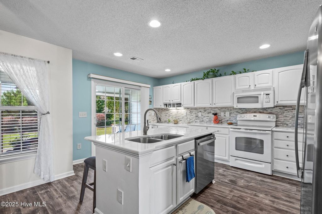 Photo of 3035 Cedar Creek Lane, Carolina Shores, NC 28467 (MLS # 100518669)