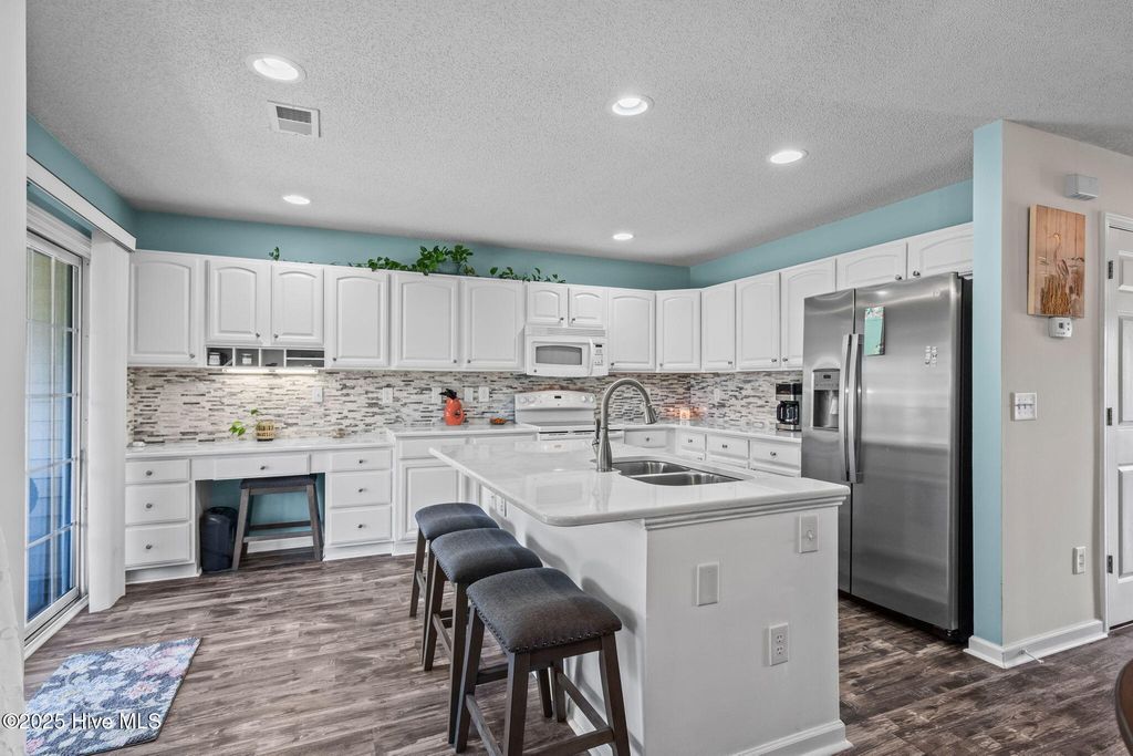 Photo of 3035 Cedar Creek Lane, Carolina Shores, NC 28467 (MLS # 100518669)