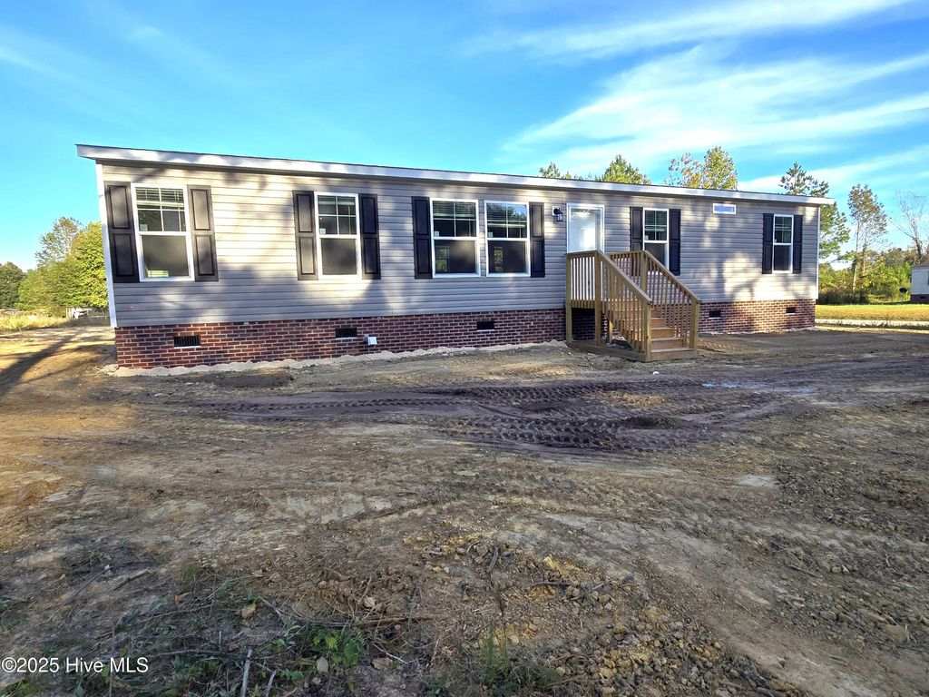 Photo of 405 S Alligator Lane, Willard, NC 28478 (MLS # 100535678)