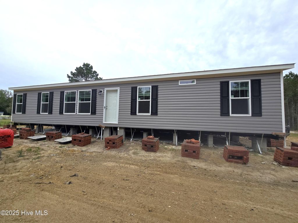 Photo of 401 S Alligator Lane, Willard, NC 28478 (MLS # 100535678)