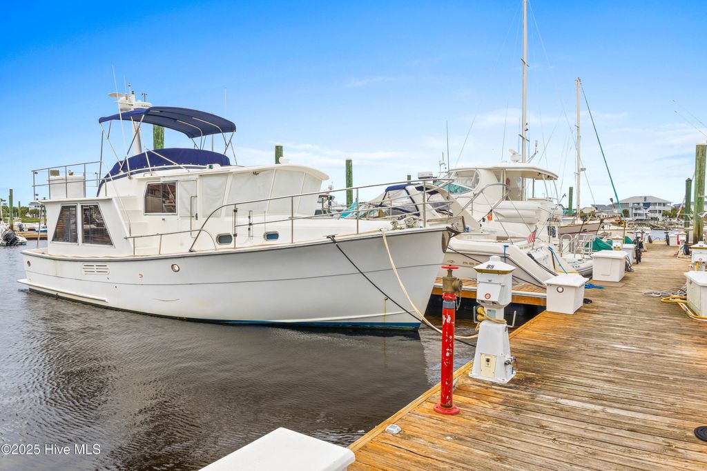 Photo of 87 Harbour Point Yacht Club Lane, Carolina Beach, NC 28428 (MLS # 100535162)