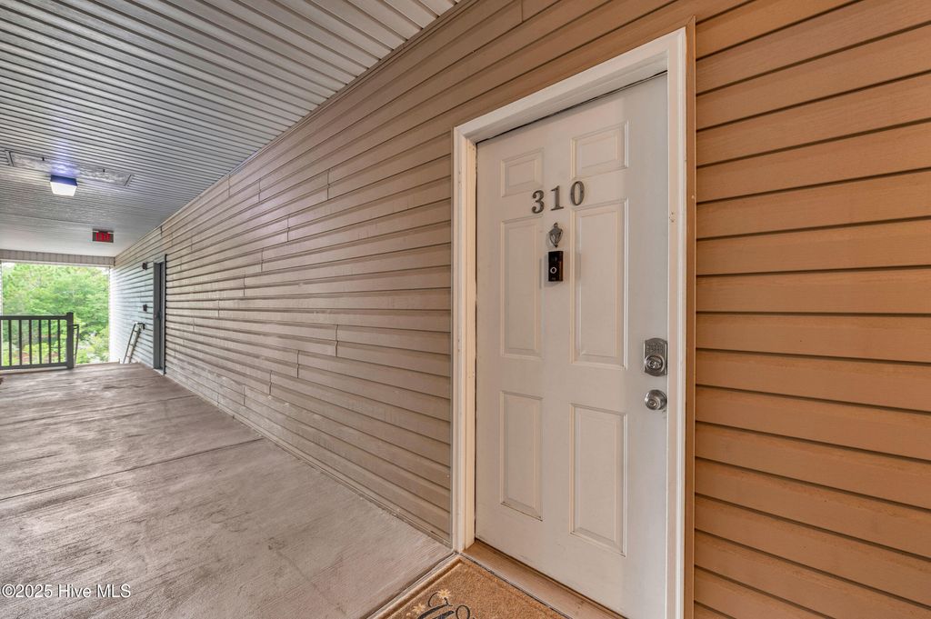 Photo of 632 Condo Club Drive #Unit 310, Wilmington, NC 28412 (MLS # 100524567)