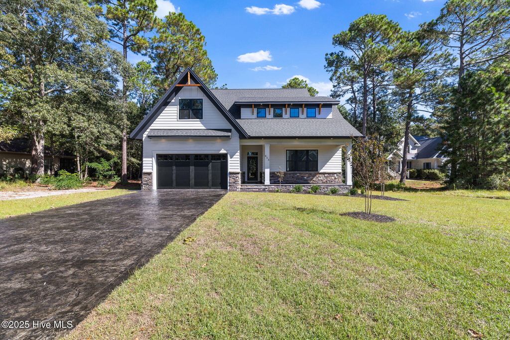 Photo of 613 Riverwood Drive SE, Bolivia, NC 28422 (MLS # 100522632)