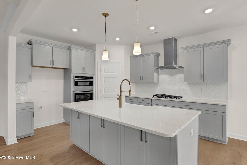 Photo of 201 Planters Walk, Hampstead, NC 28443 (MLS # 100522445)