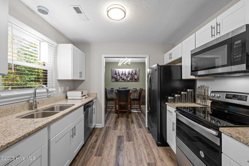 Photo of 202 Hassellwood Drive, Jamestown, NC 27282 (MLS # 100539169)