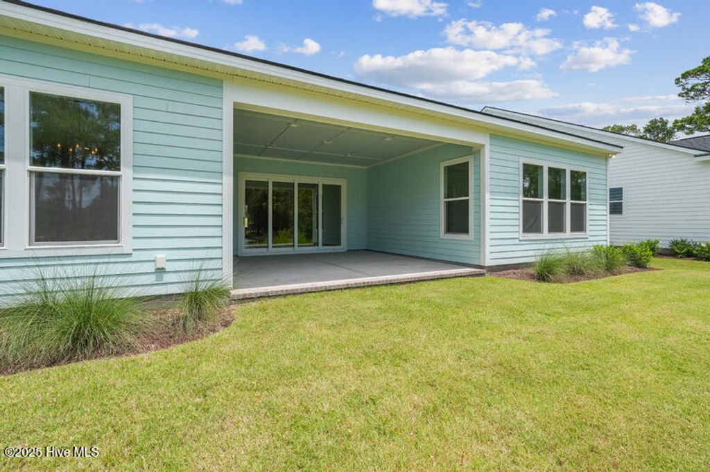 Photo of 6087 Ocean Isle Palms Way SW, Shallotte, NC 28470 (MLS # 100525654)