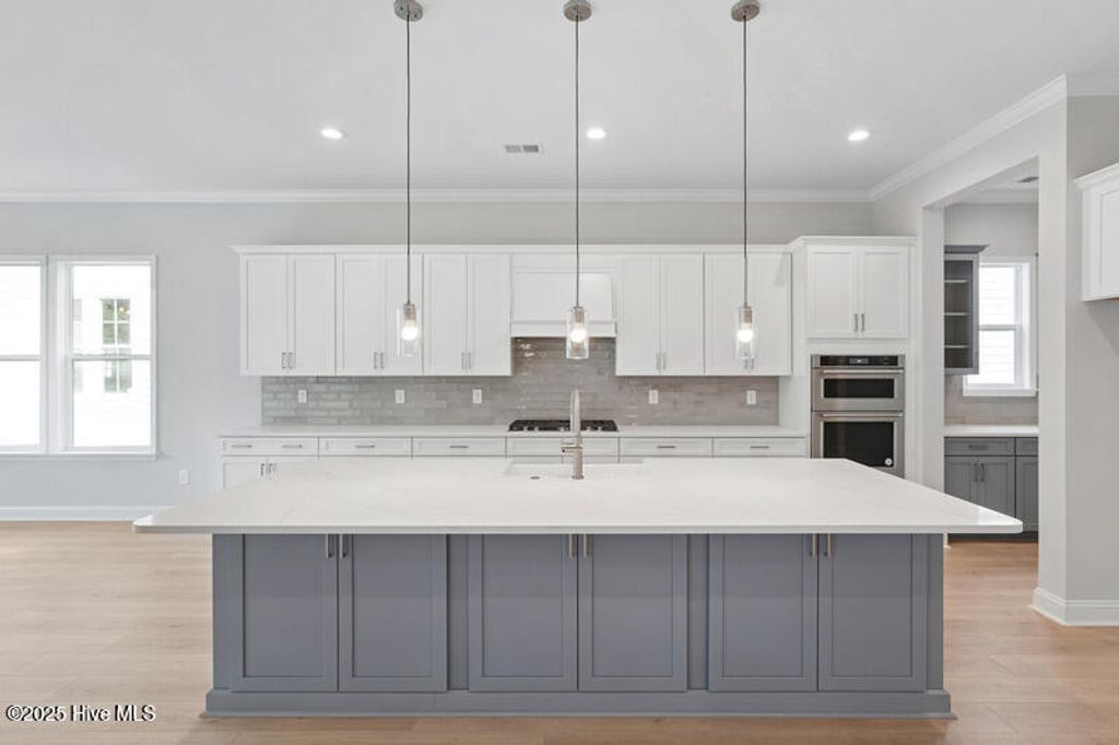 Photo of 6087 Ocean Isle Palms Way SW, Shallotte, NC 28470 (MLS # 100525654)