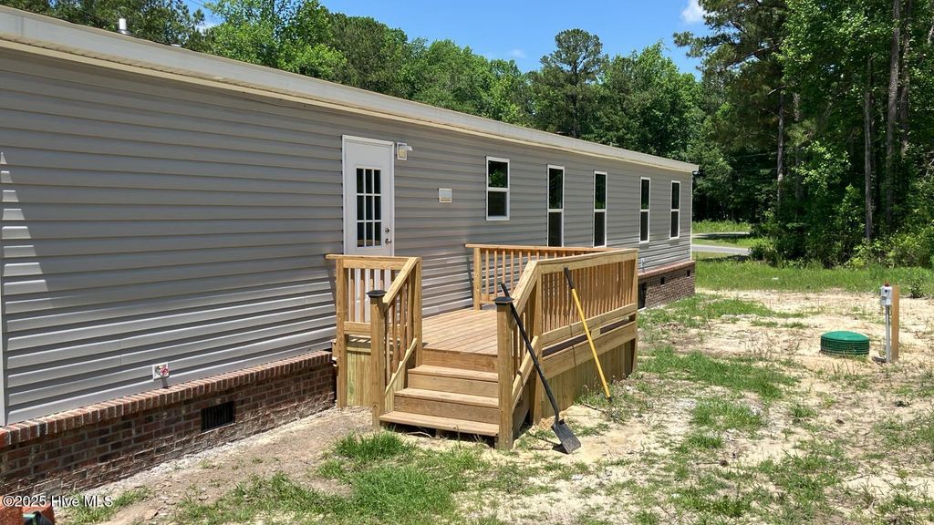 Photo of 730 Gurganus Road, Maple Hill, NC 28454 (MLS # 100511766)
