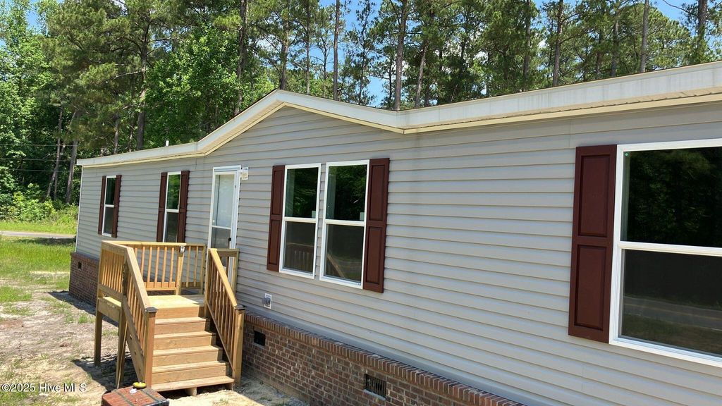 Photo of 730 Gurganus Road, Maple Hill, NC 28454 (MLS # 100511766)