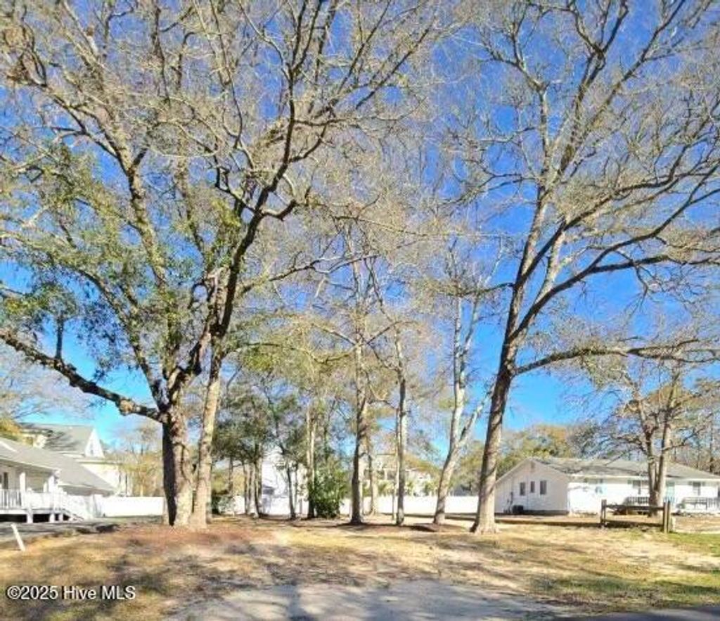 Photo of 42 NE 8th Street, Oak Island, NC 28465 (MLS # 100529578)