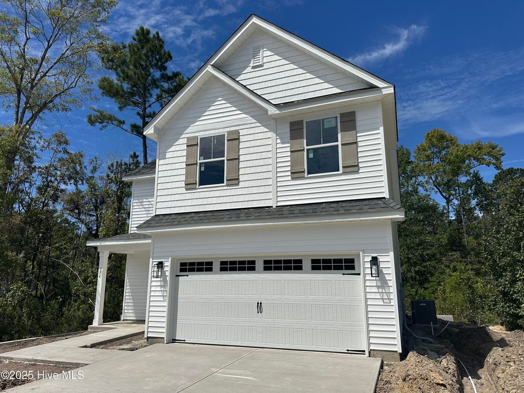 Photo of 574 Poppleton Drive, Hampstead, NC 28443 (MLS # 100516155)