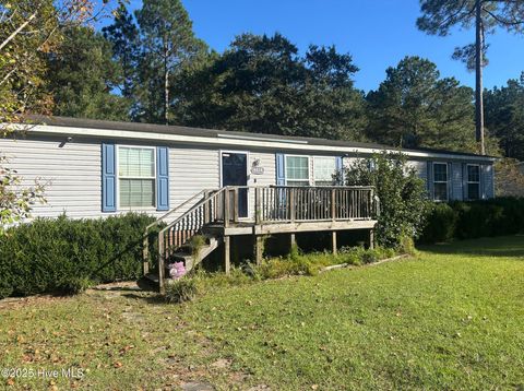 Photo of 4834 Grinders Way NE, Leland, NC 28451 (MLS # 100538160) Photo of 4834 Grinders Way NE, Leland, NC 28451 (MLS # 100538160)