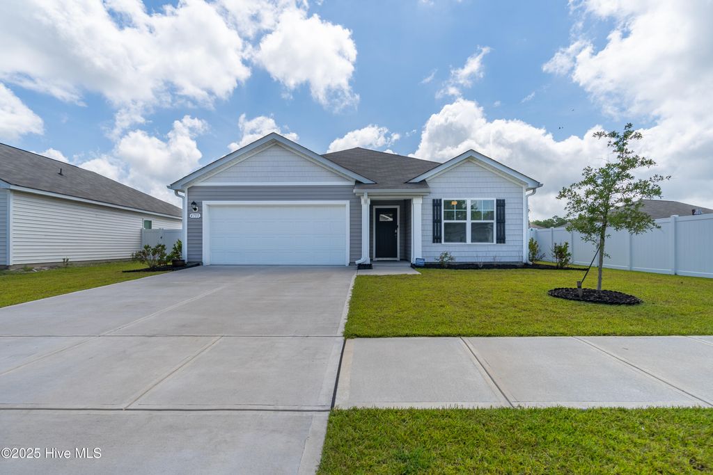 Photo of 4755 Cockatoo Drive NW, Shallotte, NC 28470 (MLS # 100518104)